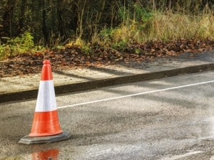 ALARM Survey - traffic cone over pothole in road