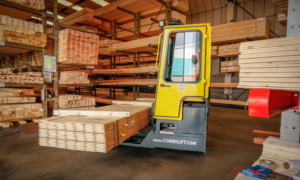 Combilift investment - forklift carrying planks of wood