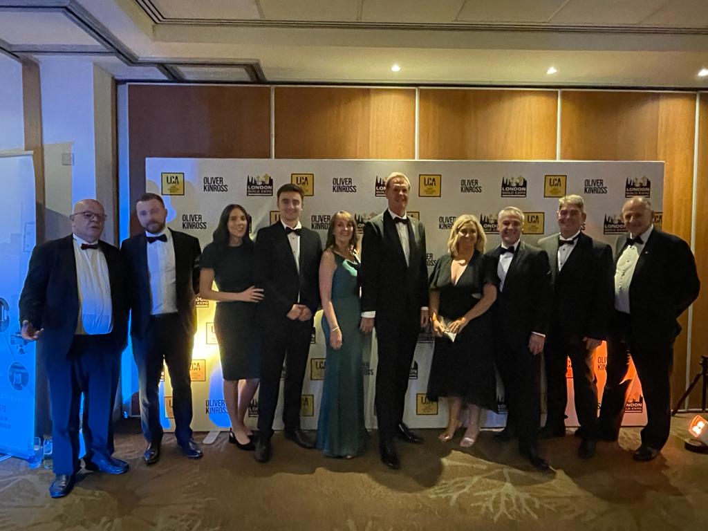 Group shot of the Dawsongroup vans team attending the London Construction Awards 2023.