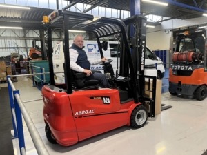 Paul hull driving forklift truck in Dawsongroup material handling warehouse