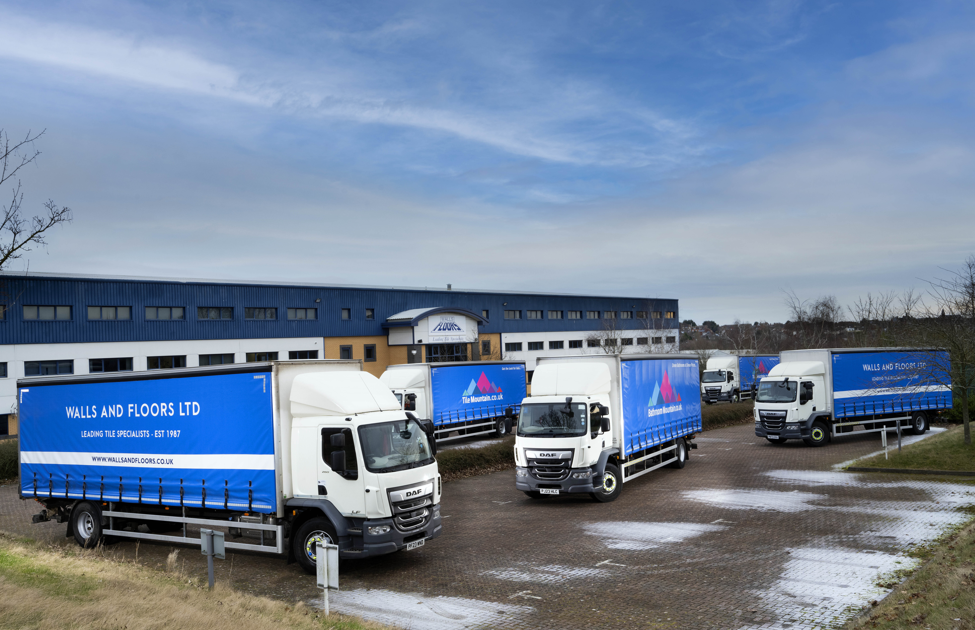 Walls and Floors, a part of the Tile Mountain Group, takes delivery of nine DAF LF 18t Curtainside Trucks