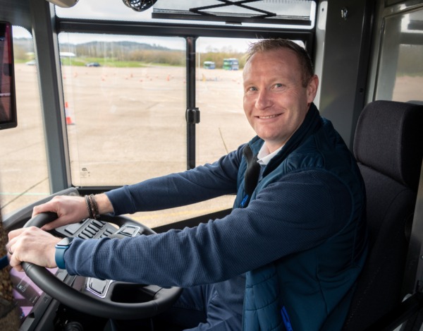 Lee Salt, Regional Sales Manager for Dawsongroup bus and coach, driving a bus.